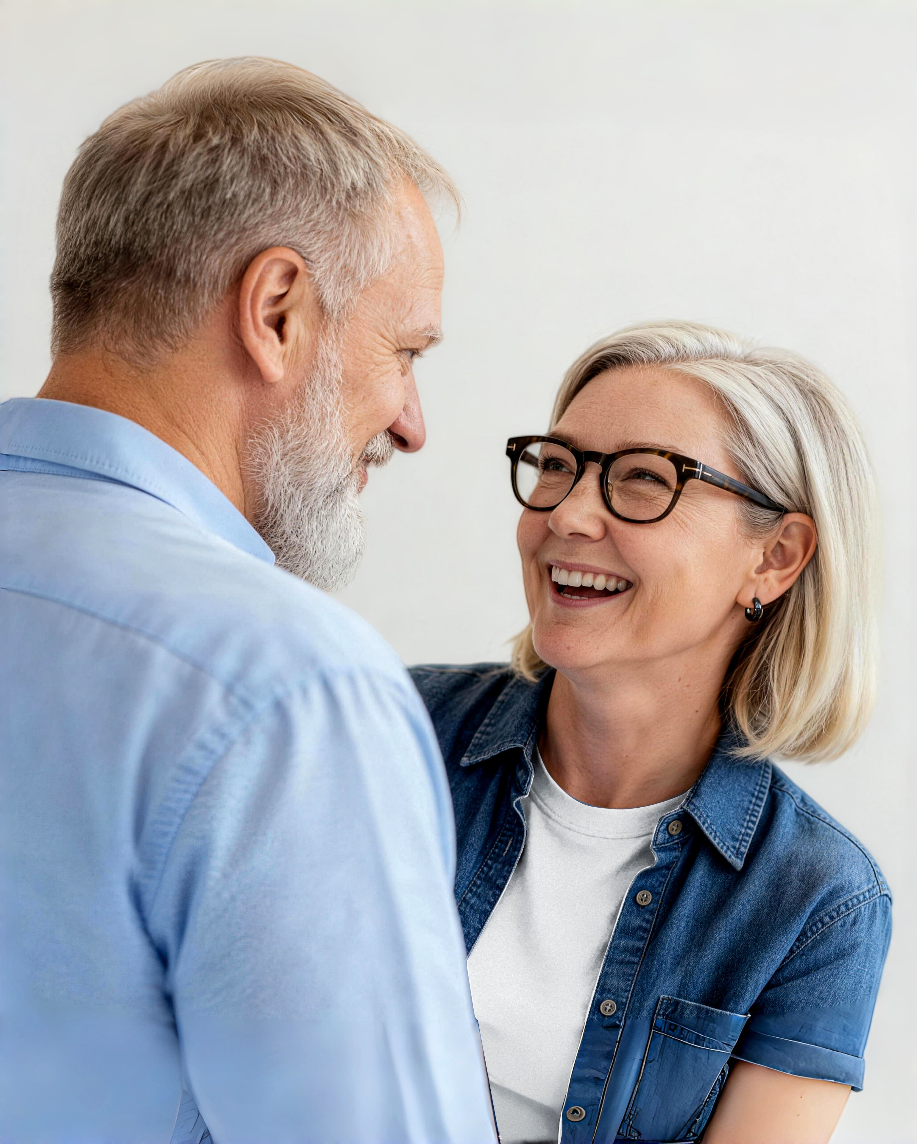 Two people smiling at each other 