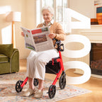 Woman using a red kekoy mobility rollator reading a newspaper.