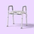 Bathroom toilet riser with armrests on a light purple background
