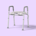 Bathroom toilet riser with armrests on a light purple background